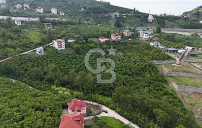 TRABZON BENGİSU DA AZ EĞİMLİ 20 METRE YOLA CEPHE SATILIK ARAZİ