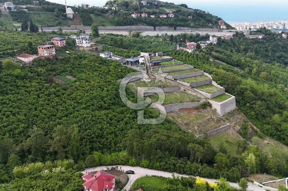 TRABZON BENGİSU DA AZ EĞİMLİ 20 METRE YOLA CEPHE SATILIK ARAZİ