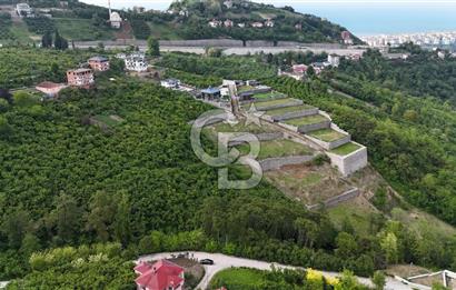 TRABZON BENGİSU DA AZ EĞİMLİ 20 METRE YOLA CEPHE SATILIK ARAZİ