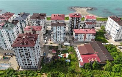 ARSİN YEŞİLYALI DA ANA YOLA 50 MT SİTE İÇİNDE KAT KARŞILIĞI ARSA