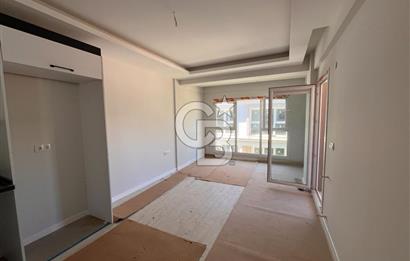 YENİFOÇA OLİVEPARK EVLERİ'NDE HAVUZLU SİTEDE 2+1 SATILIK DAİRE