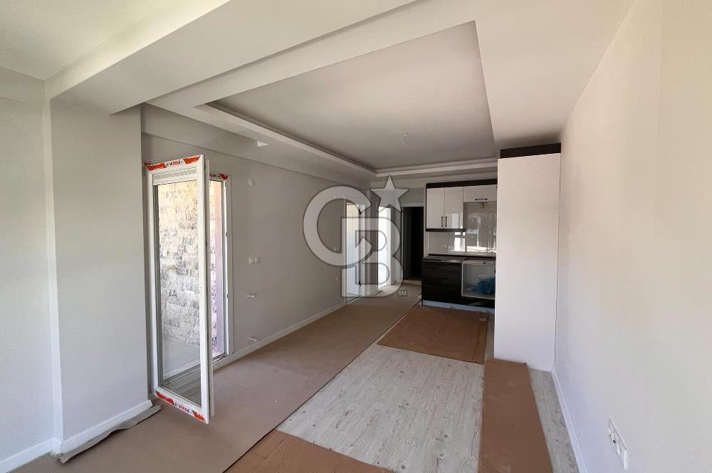 YENİFOÇA OLİVEPARK EVLERİ'NDE HAVUZLU SİTEDE 2+1 SATILIK DAİRE