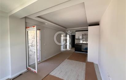 YENİFOÇA OLİVEPARK EVLERİ'NDE HAVUZLU SİTEDE 2+1 SATILIK DAİRE
