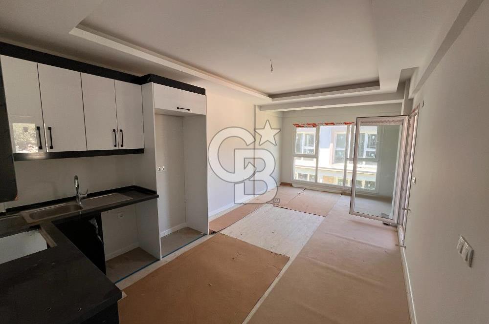 YENİFOÇA OLİVEPARK EVLERİ'NDE HAVUZLU SİTEDE 2+1 SATILIK DAİRE