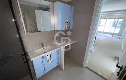 YENİFOÇA OLİVEPARK EVLERİ'NDE HAVUZLU SİTEDE 2+1 SATILIK DAİRE