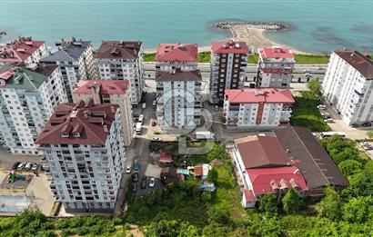 ARSİN YEŞİLYALI DA ANA YOLA 50 MT SİTE İÇİNDE KAT KARŞILIĞI ARSA