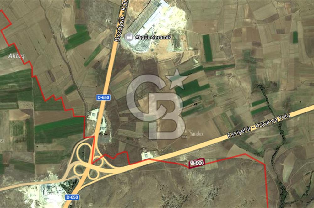 CB CITY'DEN ESKİŞEHİR KÜTAHYA ÇEVRE YOLU KENARI YOLU OLAN TARLA