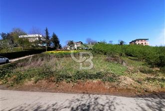 TRABZON ÇİMENLİ'DE EĞİMSİZ, ANAYOLA YAKIN 1136 M2 SATILIK ARAZİ