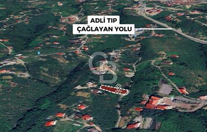 TRABZON ÇİMENLİ'DE EĞİMSİZ, ANAYOLA YAKIN 1136 M2 SATILIK ARAZİ