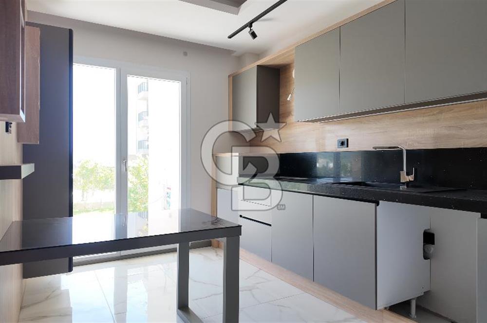 KUŞADASI TÜRKMEN MAHALLESİ 265 M2 BAHÇEYE SAHİP 2+1 DAİRE