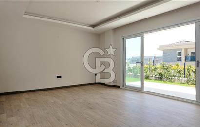 KUŞADASI TÜRKMEN MAHALLESİ 265 M2 BAHÇEYE SAHİP 2+1 DAİRE