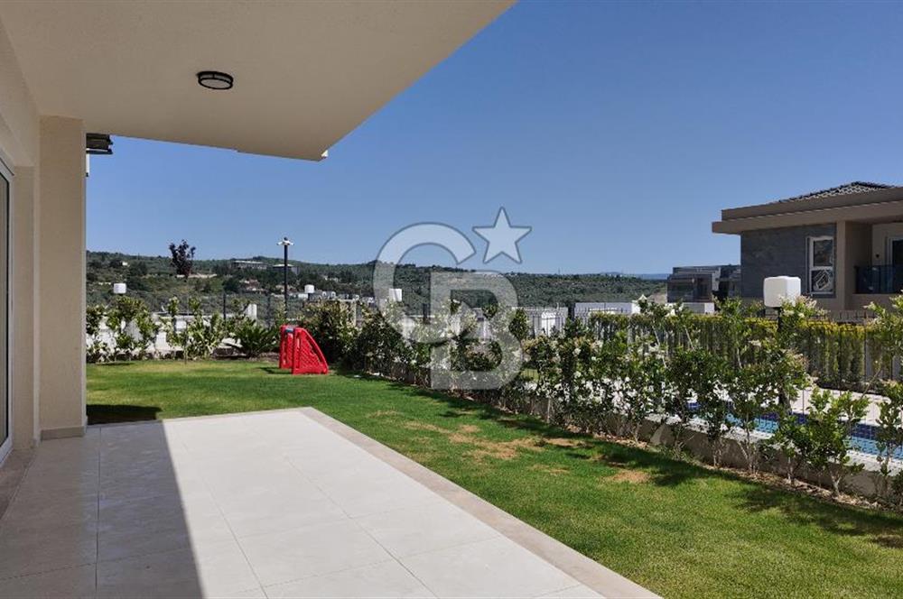 KUŞADASI TÜRKMEN MAHALLESİ 265 M2 BAHÇEYE SAHİP 2+1 DAİRE