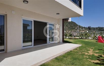 KUŞADASI TÜRKMEN MAHALLESİ 265 M2 BAHÇEYE SAHİP 2+1 DAİRE