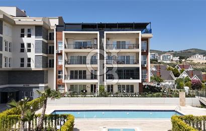 KUŞADASI TÜRKMEN MAHALLESİ 265 M2 BAHÇEYE SAHİP 2+1 DAİRE