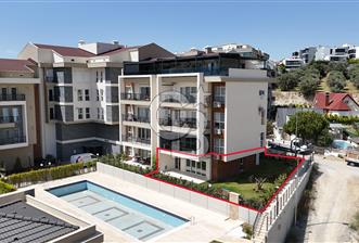 KUŞADASI TÜRKMEN MAHALLESİ 265 M2 BAHÇEYE SAHİP 2+1 DAİRE