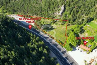 Menteşe'de Muğla-Denizli Yoluna Sıfır 6525 m2 Satılık Tarla