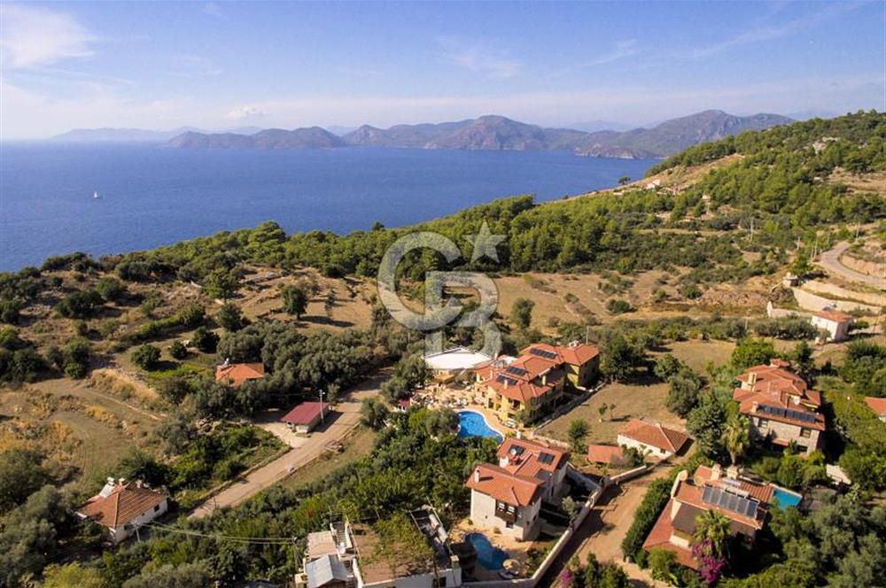 Fethiye Faralya’da Satılık Yüksek Gelir Getiren Doğanın İçinde Yatırımlık Butik Otel 