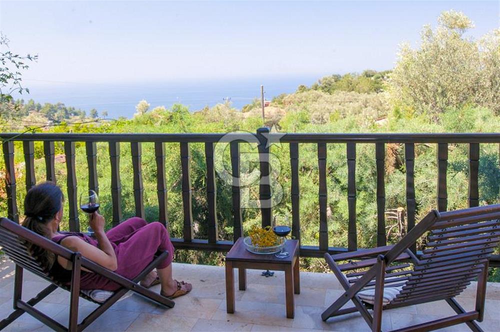 Fethiye Faralya’da Satılık Yüksek Gelir Getiren Doğanın İçinde Yatırımlık Butik Otel 