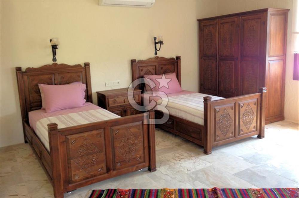 Fethiye Faralya’da Satılık Yüksek Gelir Getiren Doğanın İçinde Yatırımlık Butik Otel 