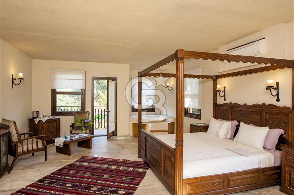 Fethiye Faralya’da Satılık Yüksek Gelir Getiren Doğanın İçinde Yatırımlık Butik Otel 