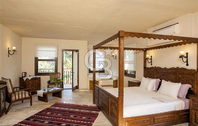 Fethiye Faralya’da Satılık Yüksek Gelir Getiren Doğanın İçinde Yatırımlık Butik Otel 