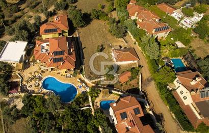 Fethiye Faralya’da Satılık Yüksek Gelir Getiren Doğanın İçinde Yatırımlık Butik Otel 