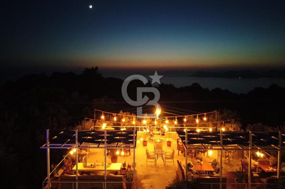 Fethiye Faralya’da Satılık Yüksek Gelir Getiren Doğanın İçinde Yatırımlık Butik Otel 