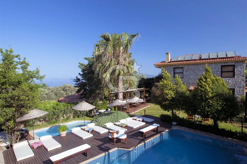 Fethiye Faralya’da Satılık Yüksek Gelir Getiren Doğanın İçinde Yatırımlık Butik Otel 
