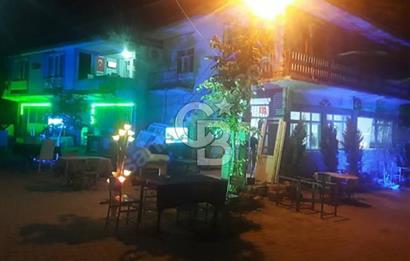 C/B DEN ALAŞEHİR SOĞANLI MAH. KÖY MERKEZİNDE SATILIK DÜKKANLI BİNA