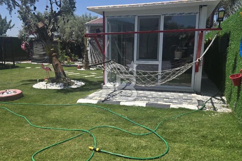 SATILIK TORBALI DAĞKIZILCA’DA İÇİNDE 1+1 EVİ BULUNAN  ZEYTİNLİ TARLA
