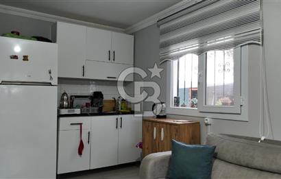 SATILIK TORBALI DAĞKIZILCA’DA İÇİNDE 1+1 EVİ BULUNAN  ZEYTİNLİ TARLA