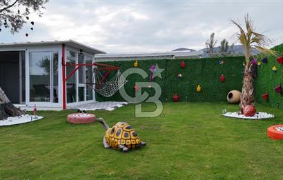 SATILIK TORBALI DAĞKIZILCA’DA İÇİNDE 1+1 EVİ BULUNAN  ZEYTİNLİ TARLA
