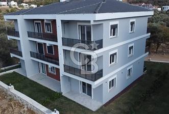 YENİ FOÇA'DA MÜSTAKİL BAHÇELİ 2+1 EŞYALI KİRALIK DAİRE