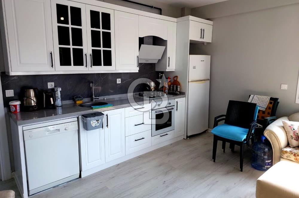 YENİ FOÇA'DA MÜSTAKİL BAHÇELİ 2+1 EŞYALI KİRALIK DAİRE
