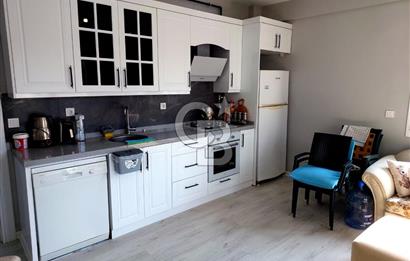 YENİ FOÇA'DA MÜSTAKİL BAHÇELİ 2+1 EŞYALI KİRALIK DAİRE