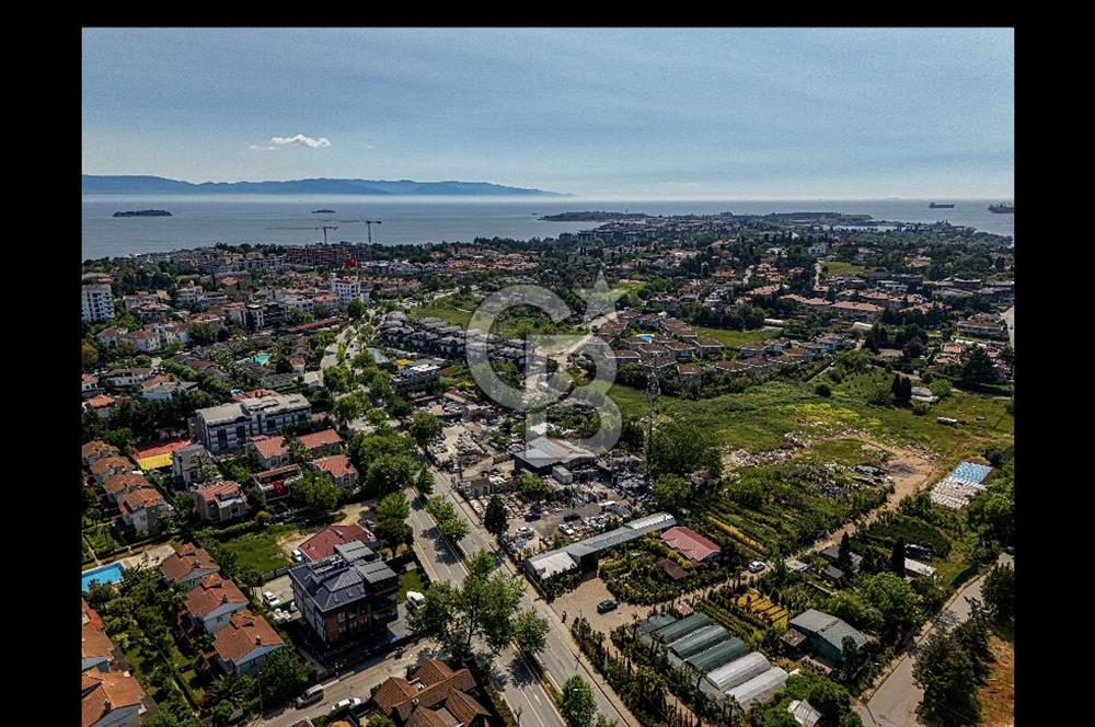 TUZLA RAUF ORBAY CADDESİ ÜZERİNDE 6110 M2 SATILIK EMSALSİZ ARSA