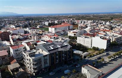 KUŞADASI DAVUTLAR MERKEZ , CADDE ÜZERİ 2+1 SATILIK DAİRE 
