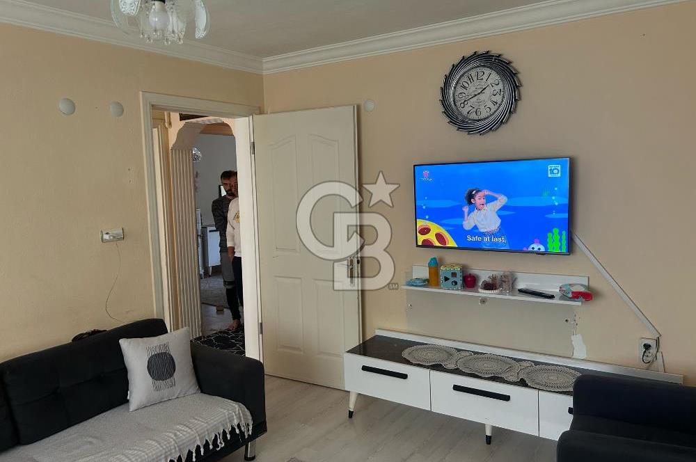 Bayraklı'nın merkezinde aile apartmanında satılık 2+1 daire 