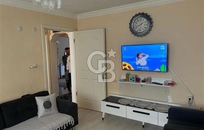 Bayraklı'nın merkezinde aile apartmanında satılık 2+1 daire 