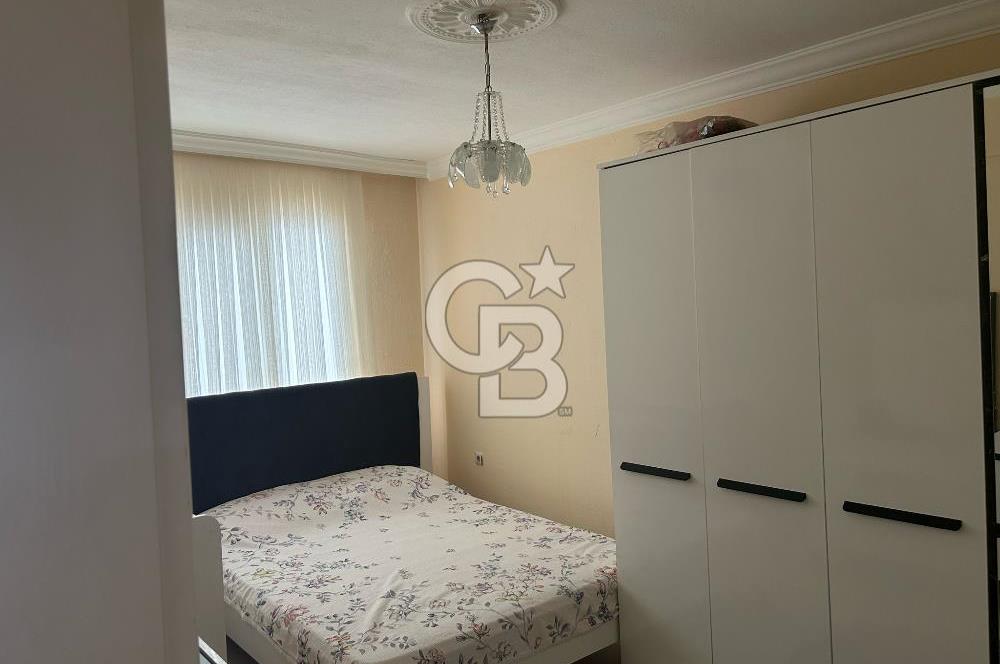Bayraklı'nın merkezinde aile apartmanında satılık 2+1 daire 
