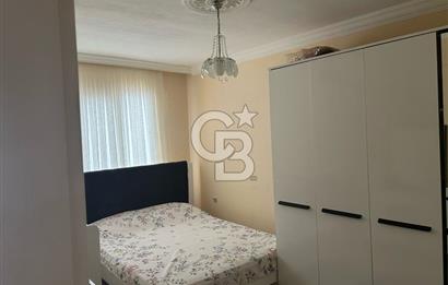 Bayraklı'nın merkezinde aile apartmanında satılık 2+1 daire 