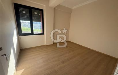 Foça Bağarası'nda Satılık 2+1 Bahçe Katı Daire