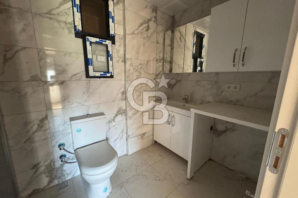 Foça Bağarası'nda Satılık 2+1 Bahçe Katı Daire