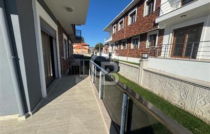 Foça Bağarası'nda Satılık 2+1 Bahçe Katı Daire