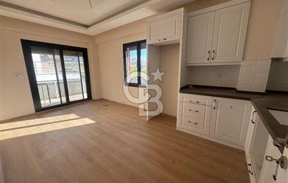 Foça Bağarası'nda Satılık 2+1 Bahçe Katı Daire