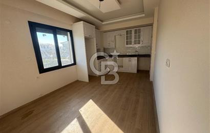 Foça Bağarası'nda Satılık 2+1 Bahçe Katı Daire