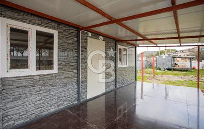 Foça Bağarası Hacıveli'de Satılık 2+1 Prefabrik ve Tarla