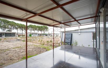 Foça Bağarası Hacıveli'de Satılık 2+1 Prefabrik ve Tarla