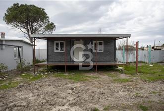 Foça Bağarası Hacıveli'de Satılık 2+1 Prefabrik ve Tarla