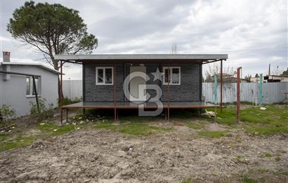 Foça Bağarası Hacıveli'de Satılık 2+1 Prefabrik ve Tarla